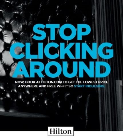 Promotional ad for Hilton, urging users to book directly for the lowest prices and free Wi-Fi, featuring bold blue typography.