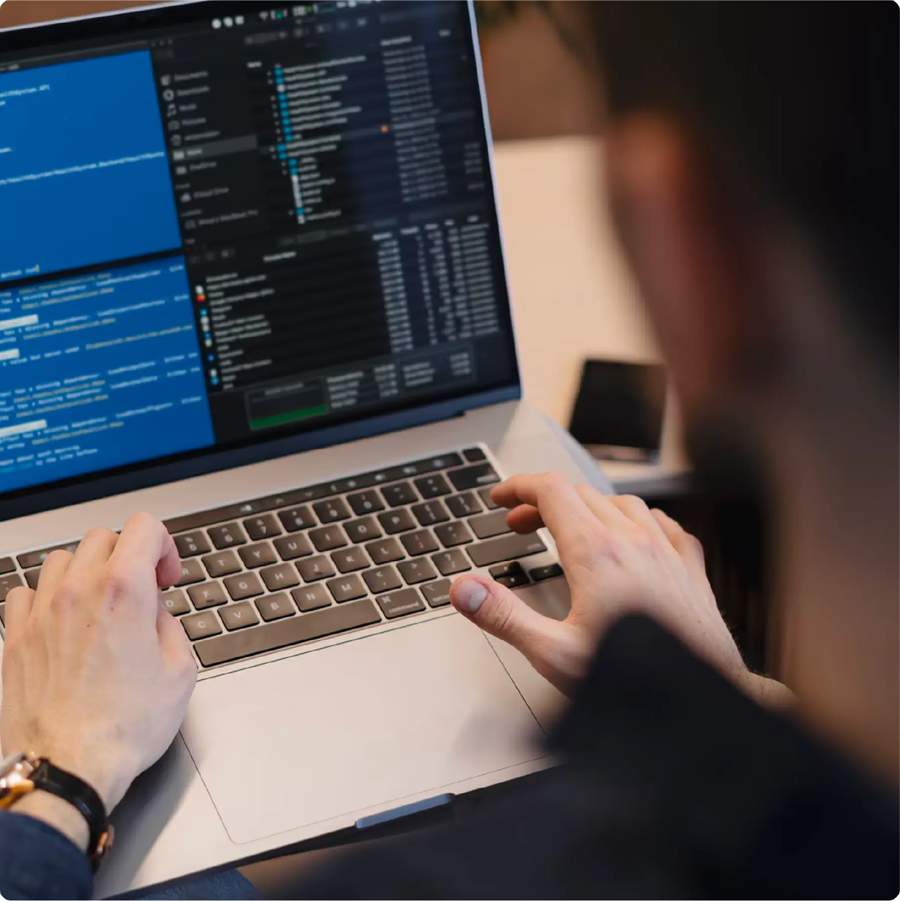 A person doing coding and HTML